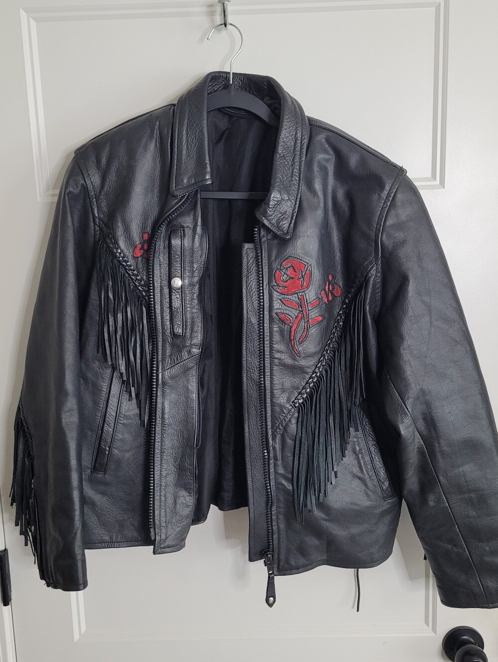 vintage leather motorcycle jacket featuring red embroidered roses and trim